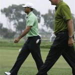 Tiger Woods, left, and Phil Mickelson walk down the 14th fairway together during the second round of the US Open championship at Torrey Pines Golf Course on Friday, June 13, 2008 in San Diego. (AP Photo/Matt Slocum)