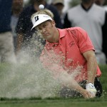 Stuart Appleby of Australia watches his ball as he blasts out of a bunker at the first green during the third round of the US Open championship at Torrey Pines Golf Course on Saturday, June 14, 2008 in San Diego. (AP Photo/Lenny Ignelzi)