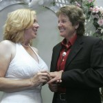 Janet Nottley, left, smiles as she slips a wedding ring on the finger of Jen Borgen during their wedding ceremony held at the Sacramento County Clerk/Recorder's office in Sacramento, Calif., Tuesday, June 17, 2008. (AP Photo/Rich Pedroncelli)