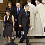 NBC "Today" show host Matt Lauer, right, walks out of Holy Trinity Church in Washington, Wednesday, June 18, 2008, following the funeral mass for NBC's Tim Russert. He is followed by former General Electric Chief Executive Officer Jack Welch. At left is Lauer's wife Annette Roque. (AP Photo/J. Scott Applewhite)
