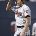 Arizona Diamondbacks pitcher Randy Johnson heads to the dugout after the third inning where he gave up six runs to the Minnesota Twins in a baseball game Friday, June 20, 2008, in Minneapolis. (AP Photo/Jim Mone)