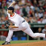 Boston Red Sox starter Josh Beckett delivers against the Arizona Diamondbacks in the second inning of their MLB baseball game at Fenway Park in Boston, Monday June 23, 2008. (AP Photo/Charles Krupa)
