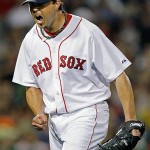 Boston Red Sox starter Josh Beckett yells as he walks off the mound while trailing 2-0 against the Arizona Diamondbacks in the eighth inning of their MLB baseball game at Fenway Park in Boston, Monday June 23, 2008. (AP Photo/Charles Krupa)