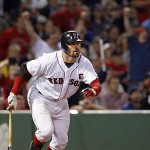 Boston Red Sox's Jason Varitek runs to first on his go-ahead RBI single against the Arizona Diamondbacks in the eighth inning of a baseball game at Fenway Park in Boston Tuesday. 