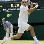 Switzerland's Roger Federer in action during his second round match against Sweden's Robin Soderling on the Centre Court at Wimbledon, Wednesday.