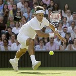Switzerland's Roger Federer in action during his second round match against Sweden's Robin Soderling on the Centre Court at Wimbledon, Wednesday.