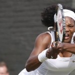 Serena Williams of the US., returns to Poland's Urszula Radwanska during their Women's Singles, second round match at Wimbledon, Wednesday.