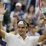 Switzerland's Roger Federer reacts after winning his second round match against Sweden's Robin Soderling on the Centre Court at Wimbledon, Wednesday. 

