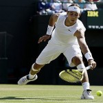 Rafael Nadal of Spain in action during his fourth round match against Russia's Mikhail Youzhny at Wimbledon, Monday.