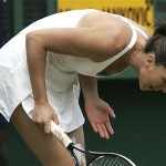 Serbia's Jelena Jankovich reacts on her way to being defeated by Thailand's Tamarine Tanasugarn in their Women's Singles, fourth round match at Wimbledon, Monday.