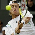 Australia's Lleyton Hewitt in action during his fourth round match against Switzerland's Rogerer Federer on the Centre Court at Wimbledon, Monday.