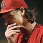 Arizona Diamondbacks' Randy Johnson walks off the field in the middle of the second inning after giving up six runs to the Milwaukee Brewers in the first two innings of a baseball game Tuesday.