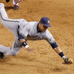 Milwaukee Brewers' Mike Rivera makes a diving catch on a line drive hit by Arizona Diamondbacks' Miguel Montero in the eighth inning of a baseball game Tuesday.