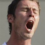 Marat Safin of Russia reacts on his way to defeating Spain's Feliciano Lopez, during their Men's Singles quarterfinal on the Number One Court at Wimbledon, Wednesday, July 2, 2008. (AP Photo/Alastair Grant)
