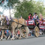 Hundreds of people turned out to watch the annual Fourth of July parade make its way down the main street of Capitan, N.M., on Friday, July 4, 2008. Communities around New Mexico celebrated the holiday with parades and fireworks shows. (AP Photo/Susan Montoya Bryan)