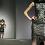 A model displays a creation designed by Dutch Chinese fashion designer Hu Shequang during the Hong Kong Fashion Week for spring/summer Wednesday, July 9, 2008 in Hong Kong. (AP Photo/Vincent Yu)
