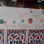 Phoenix Children's Hospital displays a "thank-you" banner in appreciation of Sports 620 KTAR's fundraising event. (Jason Chapman/KTAR)