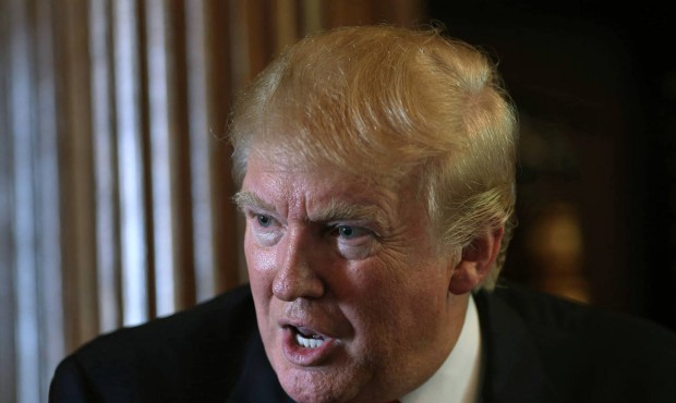 Donald Trump answers questions surrounding his bid for the U.S. presidency in Albemarle House, a pr...
