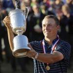
              FILE - In this Sunday, June 21, 2015, file photo, Jordan Spieth holds up the trophy after winning the U.S. Open golf tournament at Chambers Bay in University Place, Wash. Spieth loves golf history, which is appropriate for someone quickly becoming part of it. He is halfway home to the Grand Slam.  (AP Photo/Ted S. Warren, File)
            