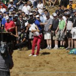 
              Martin Kaymer, of Germany, hits out of the crowd on the sixth hole during the second round of the U.S. Open golf tournament at Chambers Bay on Friday, June 19, 2015 in University Place, Wash. (AP Photo/Ted S. Warren)
            
