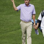 
              Jason Dufner acknowledges the gallery after hitting a hole-in-one on the 16th hole during the second round of the Memorial golf tournament, Friday, June 5, 2015, in Dublin, Ohio. (AP Photo/Darron Cummings)
            