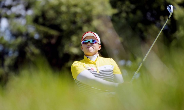 n Amy Yang of South Korea reacts after teeing off at hole No. 6 during the third round of the U.S. ...