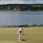 
              Branden Grace, of South Africa, reacts after missing his birdie putt on the 16th hole during the second round of the U.S. Open golf tournament at Chambers Bay on Friday, June 19, 2015 in University Place, Wash. (AP Photo/Charlie Riedel)
            