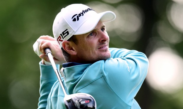 England’s Justin Rose plays a shot during day two of the BMW PGA Championship at the Wentwort...
