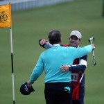 
              United States’ Tom Watson embraces his caddy Michael Watson after finishing on the 18th green during the second round of the British Open Golf Championship at the Old Course, St. Andrews, Scotland, Friday, July 17, 2015. (AP Photo/Peter Morrison)
            