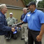 
              Golfer Jack Nicklaus, left, shakes hands with Leroy Petry, right, Tuesday, June 16, 2015 at American Lake Veterans Golf Course in Tacoma, Wash. Petry, who golfs at the course, received the Medal of Honor in 2011 for for saving the lives of fellow soldiers when he picked up a grenade in Afghanistan, losing his hand in the process. Nicklaus was at the course to inspect the progress of the "Nicklaus Nine," nine new golf holes designed by Nicklaus as a donation to the course, which provides military veterans with both rehabilitation and recreation through golf. (AP Photo/Ted S. Warren)
            