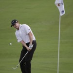 
              Jimmy Walker chips onto the 17th green during the first round of the Byron Nelson golf tournament, Thursday, May 28, 2015, in Irving, Texas. (AP Photo/LM Otero)
            