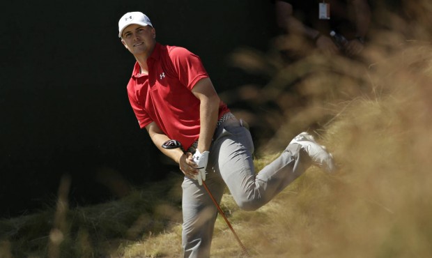 Jordan Spieth watches his tee shot on the seventh hole during the third round of the U.S. Open golf...