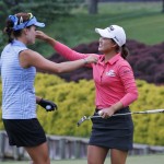 
              Minjee Lee, of Australia, right, hugs fellow golfer, Lexi Thompson, left, on the 18th hole of the rain delayed Kingsmill Championship  LPGA golf tournament at the Kingsmill Golf Club in Williamsburg, Va., Monday, May 18, 2015. Lee won the tournament. (AP Photo/Steve Helber)
            