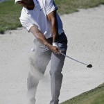 
              Tiger Woods hits from an 11th hole bunker during the first round of The Players Championship golf tournament Thursday, May 7, 2015, in Ponte Vedra Beach, Fla., Fla. (AP Photo/John Raoux)
            