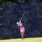 
              Alison Lee hits from the fairway on the 10th hole during the first round of the Meijer LPGA Classic golf tournament at Blythefield Country Club, Thursday, July 23, 2015, in Belmont, Mich. (AP Photo/Carlos Osorio)
            