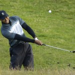 
              United States’ Tiger Woods plays from the rough on the 5th hole during the second round of the British Open Golf Championship at the Old Course, St. Andrews, Scotland, Friday, July 17, 2015. (AP Photo/David J. Phillip)
            