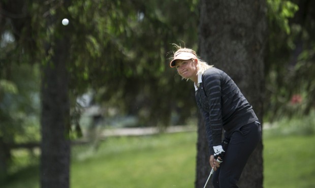 FILE – In this June 7, 2015, file photo, Suzann Pettersen chips out of the rough on the third...