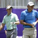 
              Brooks Koepka, right, watches his tee shot on the first hole along with Luke Donald, left, of England, during the second round of the St. Jude Classic golf tournament, Friday, June 12, 2015, in Memphis, Tenn. (AP Photo/Mark Humphrey)
            