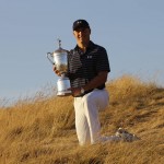 
              Jordan Spieth poses with the trophy after winning the U.S. Open golf tournament at Chambers Bay on Sunday, June 21, 2015 in University Place, Wash. (AP Photo/Ted S. Warren)
            