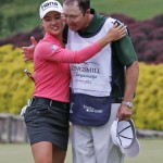 
              Minjee Lee, of Australia, left, hugs her caddie on the 18th hole after winning the the rain delayed Kingsmill Championship  LPGA golf tournament at the Kingsmill Golf Club in Williamsburg, Va., Monday, May 18, 2015.    (AP Photo/Steve Helber)
            