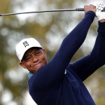 Tiger Woods hits a tee shot on the ninth hole during a practice round for to the Phoenix Open golf tournament on Tuesday, Jan. 27, 2015, in Scottsdale, Ariz. (AP Photo/Rick Scuteri)
