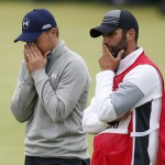 
              United States’ Jordan Spieth, left, and his caddie Michael Greller after finishing the final round at the British Open Golf Championship at the Old Course, St. Andrews, Scotland, Monday, July 20, 2015. (AP Photo/Jon Super)
            