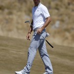 
              Dustin Johnson watches his putt on the first hole during the final round of the U.S. Open golf tournament at Chambers Bay on Sunday, June 21, 2015 in University Place, Wash. (AP Photo/Lenny Ignelzi)
            