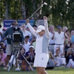 
              Inbee Park, of South Korea, celebrates after winning the KPMG Women's PGA golf championship at Westchester Country Club in Harrison, N.Y., Sunday, June 14, 2015. (AP Photo/Julio Cortez)
            