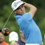
              Rickie Fowler tees off on the first hole during a practice round for The Memorial golf tournament, Wednesday, June 3, 2015, in Dublin, Ohio. (AP Photo/Jay LaPrete)
            