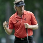 
              Bernhard Langer, of Germany, reacts to making a birdie putt on the 17th hole during the Regions Tradition Champions Tour golf tournament at Shoal Creek Country Club, Friday, May 15, 2015, in Birmingham, Ala. (AP Photo/Butch Dill)
            