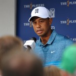 
              Tiger Woods talks with the media after a practice round for The Players Championship golf tournament in Ponte Vedra Beach, Fla., Tuesday, May 5, 2015.   (William Dickey/The Florida Times-Union via AP)
            