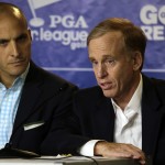 
              Steve Mona, CEO of the World Golf Foundation, gestures during a golf industry news conference at The Players Championship golf tournament Wednesday, May 6, 2015, in Ponte Vedra Beach, Fla. Looking on is Pete Bevacqua, CEO of the PGA of America. (AP Photo/Chris O'Meara)
            