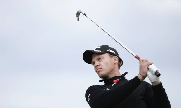 England’s Danny Willett drives a ball from the 11th tee during the second round of the Britis...