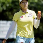 
              Chella Choi of South Korea shows her ball to the crowd at the 13th green during the third round of the U.S. Women's Open golf tournament Saturday, July 11, 2015, in Lancaster, Pa. (Chris Dunn/York Daily Record via AP)  YORK DISPATCH OUT; MANDATORY CREDIT
            